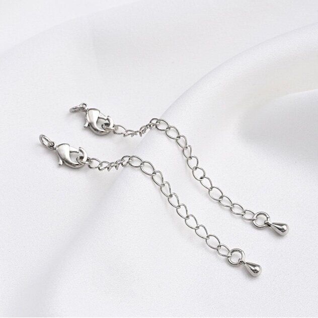 10mm platinos sp. nerūdijančio plieno kabarinas su grandinėle, 1vnt. 10mm platinos sp. nerūdijančio plieno kabarinas su grandinėle, 1vnt.