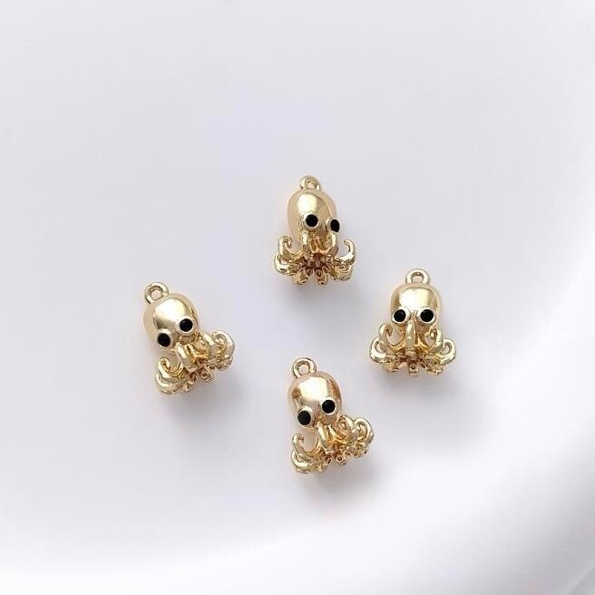 11x8mm 14k aukso sp. nerūdijančio plieno pakabukas aštuonkojis, 1vnt. 11x8mm 14k aukso sp. nerūdijančio plieno pakabukas aštuonkojis, 1vnt.
