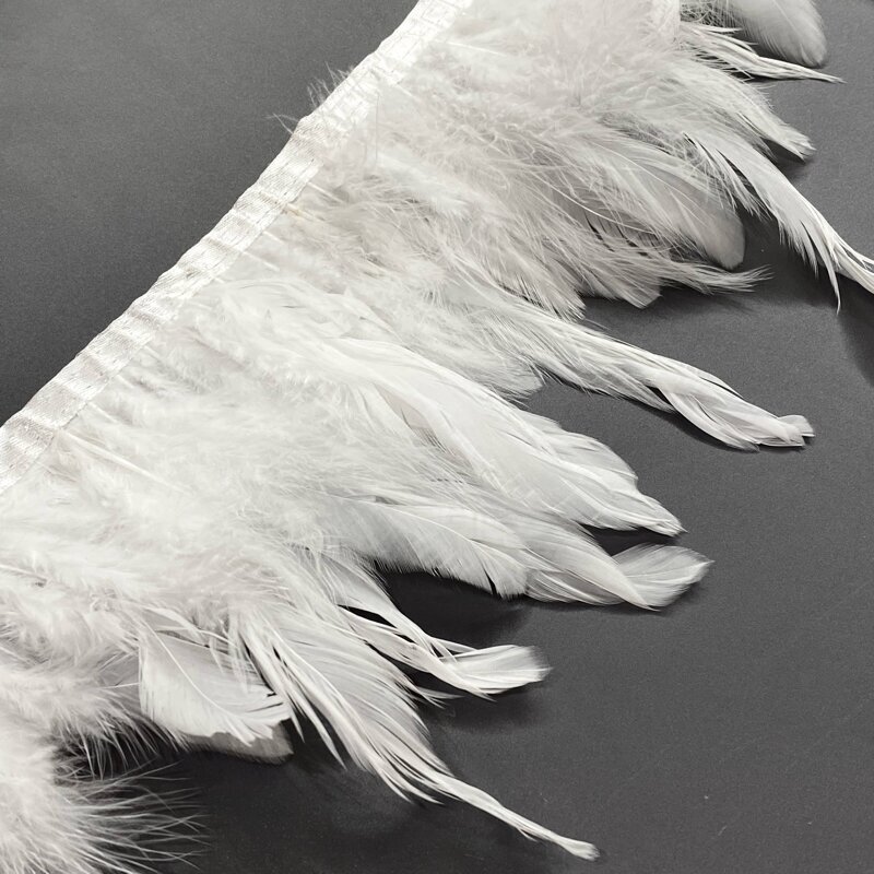 ±13cm baltos sp. plunksnų juosta, 10cm