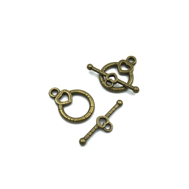 14x23mm žalvario sp. perkišamas užsegimas, 10vnt. 14x23mm žalvario sp. perkišamas užsegimas, 10vnt.