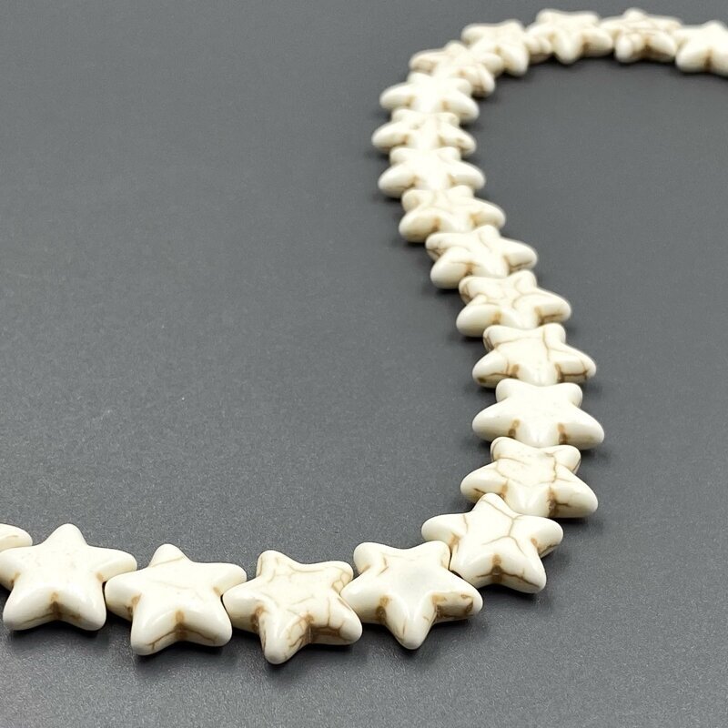 14x15mm kreminės sp. žvaigždės formos hovlitas, 40cm juosta 14x15mm kreminės sp. žvaigždės formos hovlitas, 40cm juosta