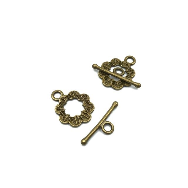 15x22mm žalvario sp. perkišamas užsegimas, 13vnt.
