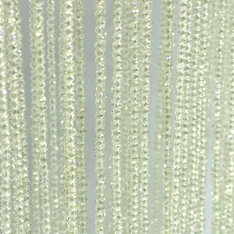 1,5x2mm gelsvos AB sp. rondelle formos stiklo kristalai, 40cm juosta