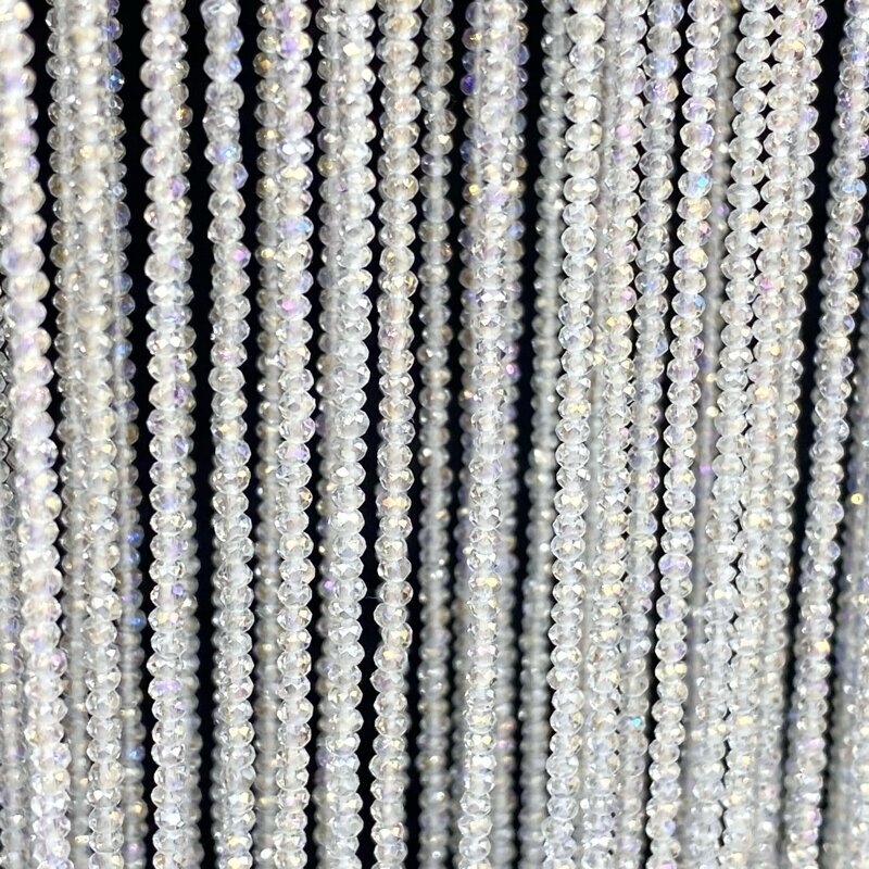 1,5x2mm skaidrios AB sp. rondelle formos stiklo kristalai, 40cm juosta