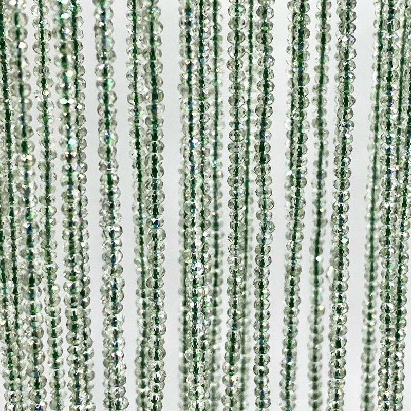 1,5x2mm žalsvos sp. rondelle formos stiklo kristalai, 40cm juosta