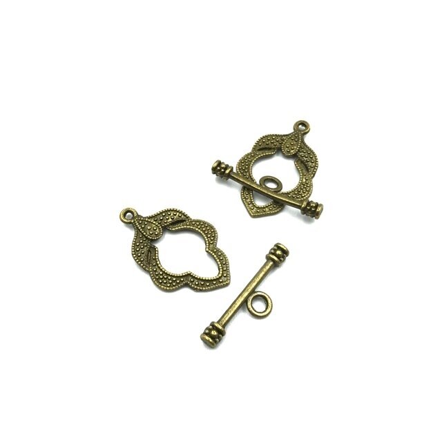 17x24mm žalvario sp. perkišamas užsegimas, 10vnt. 17x24mm žalvario sp. perkišamas užsegimas, 10vnt.