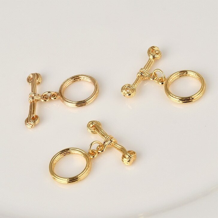 17x24mm 14k tamsinto aukso sp. nerūdijančio plieno perkišamas užsegimas, 1vnt. 17x24mm 14k tamsinto aukso sp. nerūdijančio plieno perkišamas užsegimas, 1vnt.