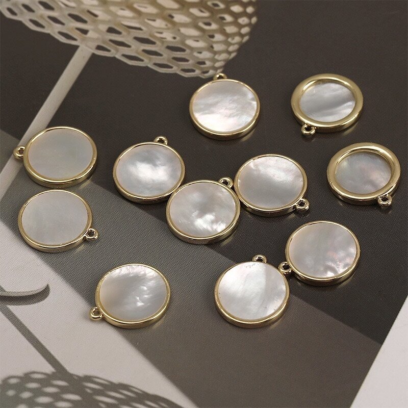 17x15mm 14k aukso sp. nerūdijančio plieno ir kriauklės pakabukas, 1vnt. 17x15mm 14k aukso sp. nerūdijančio plieno ir kriauklės pakabukas, 1vnt.