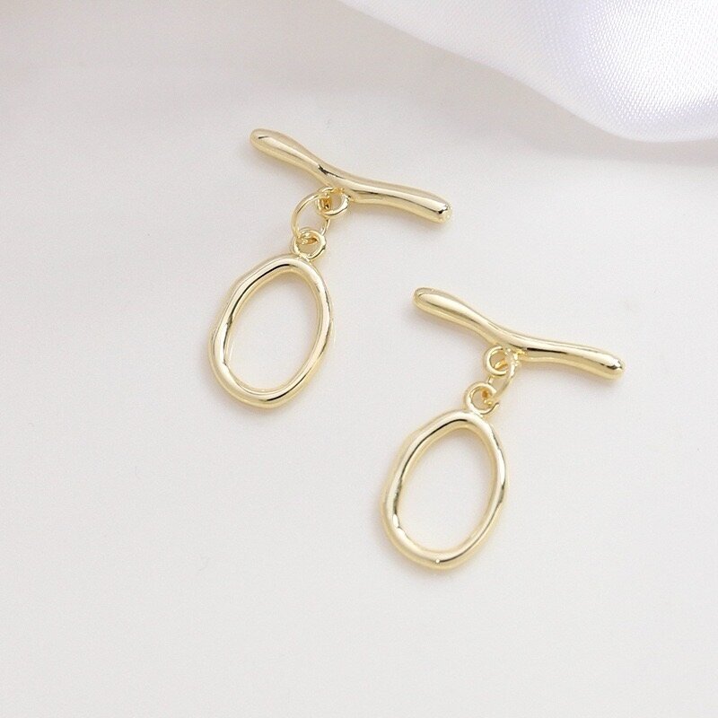 18x20mm 14k aukso sp. nerūdijančio plieno perkišamas užsegimas, 1vnt. 18x20mm 14k aukso sp. nerūdijančio plieno perkišamas užsegimas, 1vnt.