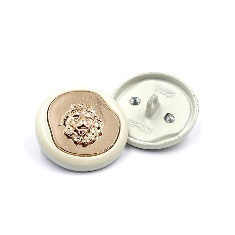 23mm kreminės ir aukso sp. metalinė saga su kilpute, 1vnt.