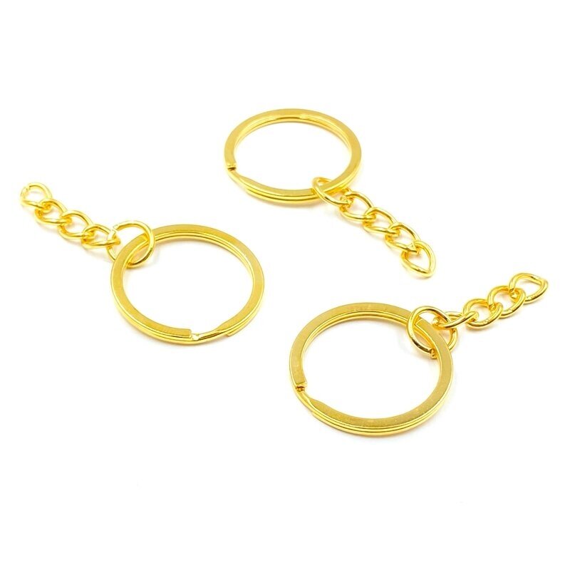 25mm aukso sp. raktų pakabukų žiedai su grandinėle, 6vnt. 25mm aukso sp. raktų pakabukų žiedai su grandinėle, 6vnt.