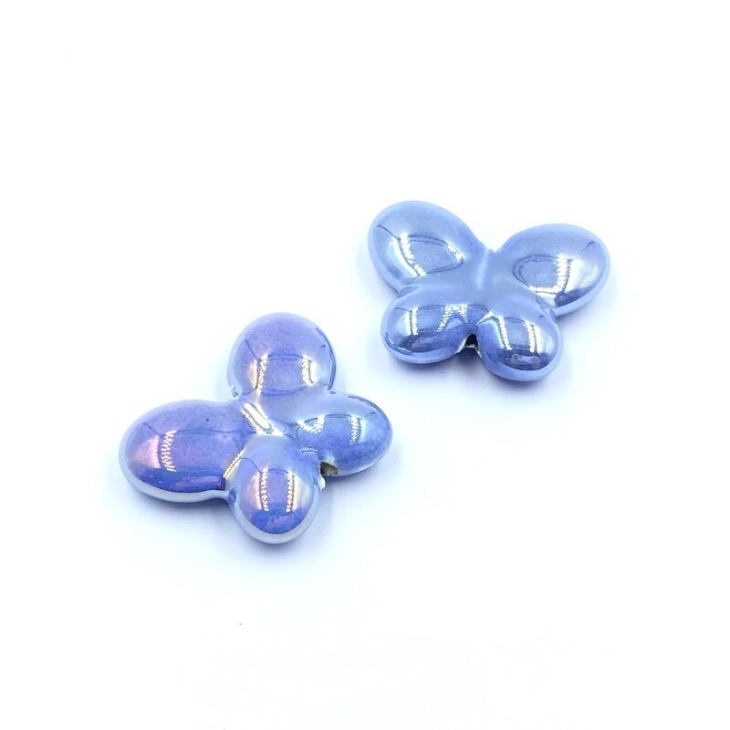 25x31mm melsvos AB sp. keramikinis drugelis, 2vnt.