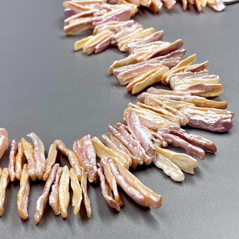 ±25x8mm rausvos mix sp. natūralūs gėlavandeniai perlai, 40cm juosta ±25x8mm rausvos mix sp. natūralūs gėlavandeniai perlai, 40cm juosta