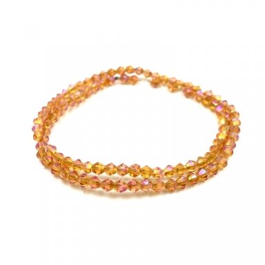 3mm skaidrūs oranžinės AB sp. bicone formos karoliukai, 30cm juosta 3mm skaidrūs oranžinės AB sp. bicone formos karoliukai, 30cm juosta