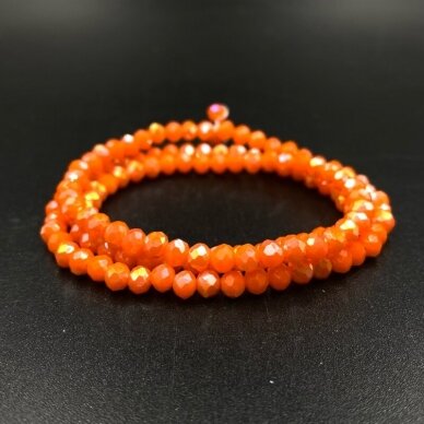 3x4mm oranžinės AB sp. rondelle formos karoliukai, 40cm juosta 3x4mm oranžinės AB sp. rondelle formos karoliukai, 40cm juosta