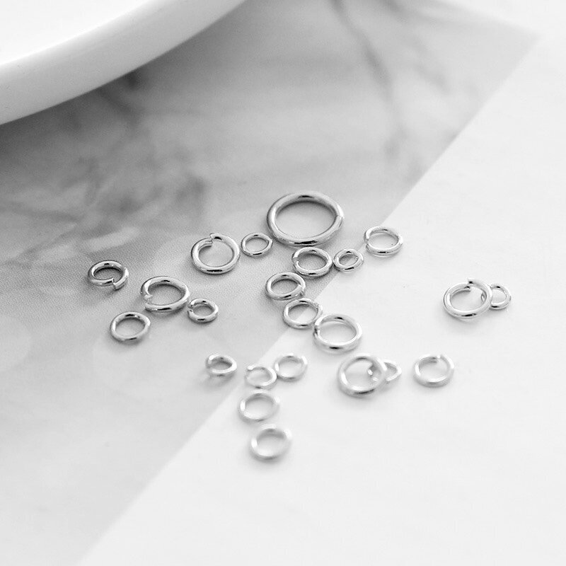 3x0,3mm platinos sp. nerūdijančio plieno žiedeliai, 20vnt.