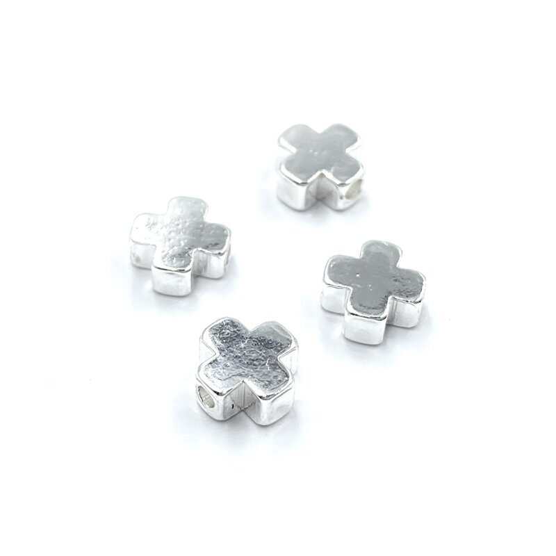 6mm sidabro sp. nerūdijančio plieno intarpas pliusas, 4vnt. 6mm sidabro sp. nerūdijančio plieno intarpas pliusas, 4vnt.