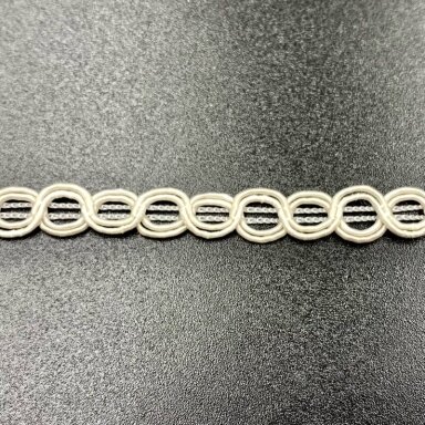 7mm kreminės sp. sintetinis nėrinys, 1m