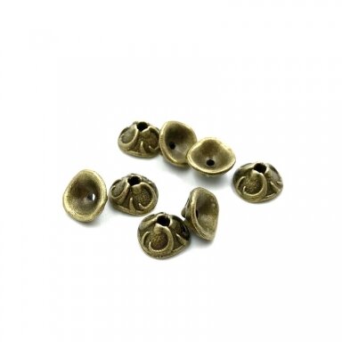 7x4mm žalvario sp. kepurėlės, 42vnt.