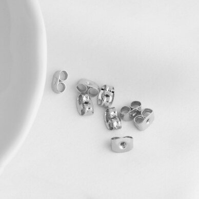 7x4mm platinos sp. nerūdijančio plieno auskarų fiksatoriai, 10vnt. 7x4mm platinos sp. nerūdijančio plieno auskarų fiksatoriai, 10vnt.