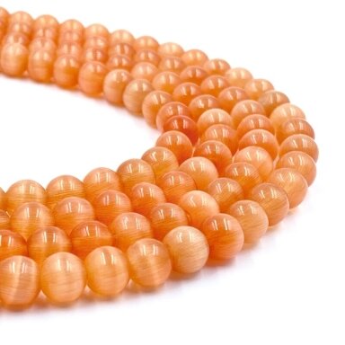 8mm oranžinės sp. katės akis, 40cm juosta