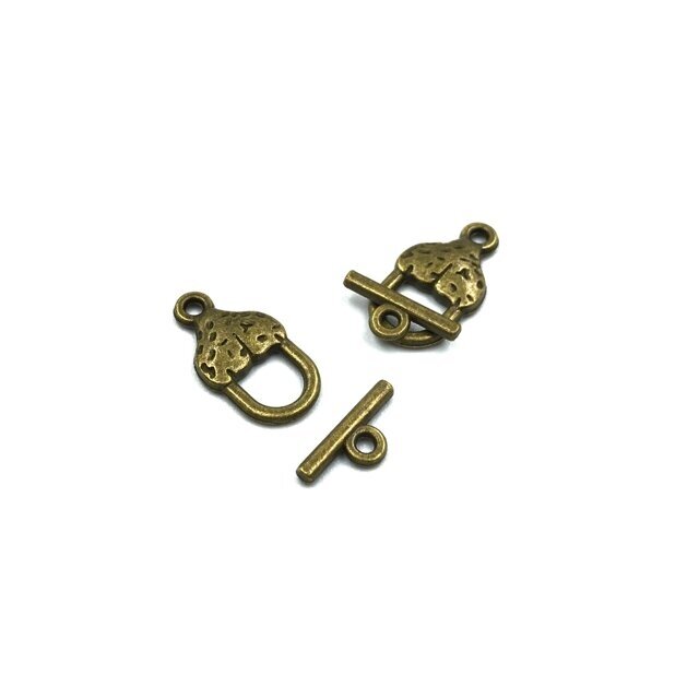 9x12mm žalvario sp. perkišamas užsegimas, 16vnt. 9x12mm žalvario sp. perkišamas užsegimas, 16vnt.